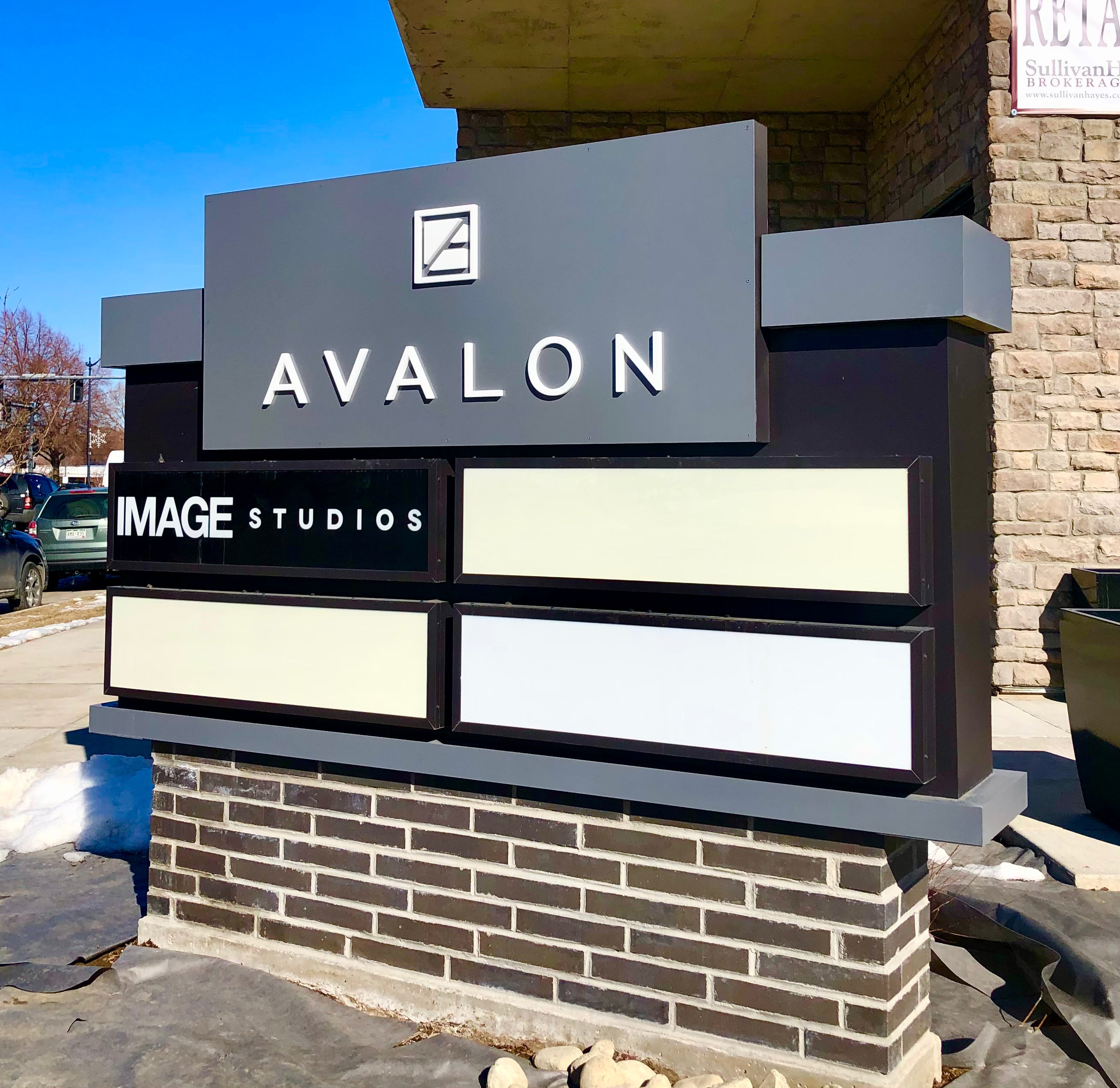 Custom design fabricated monument business signage for Avalon.