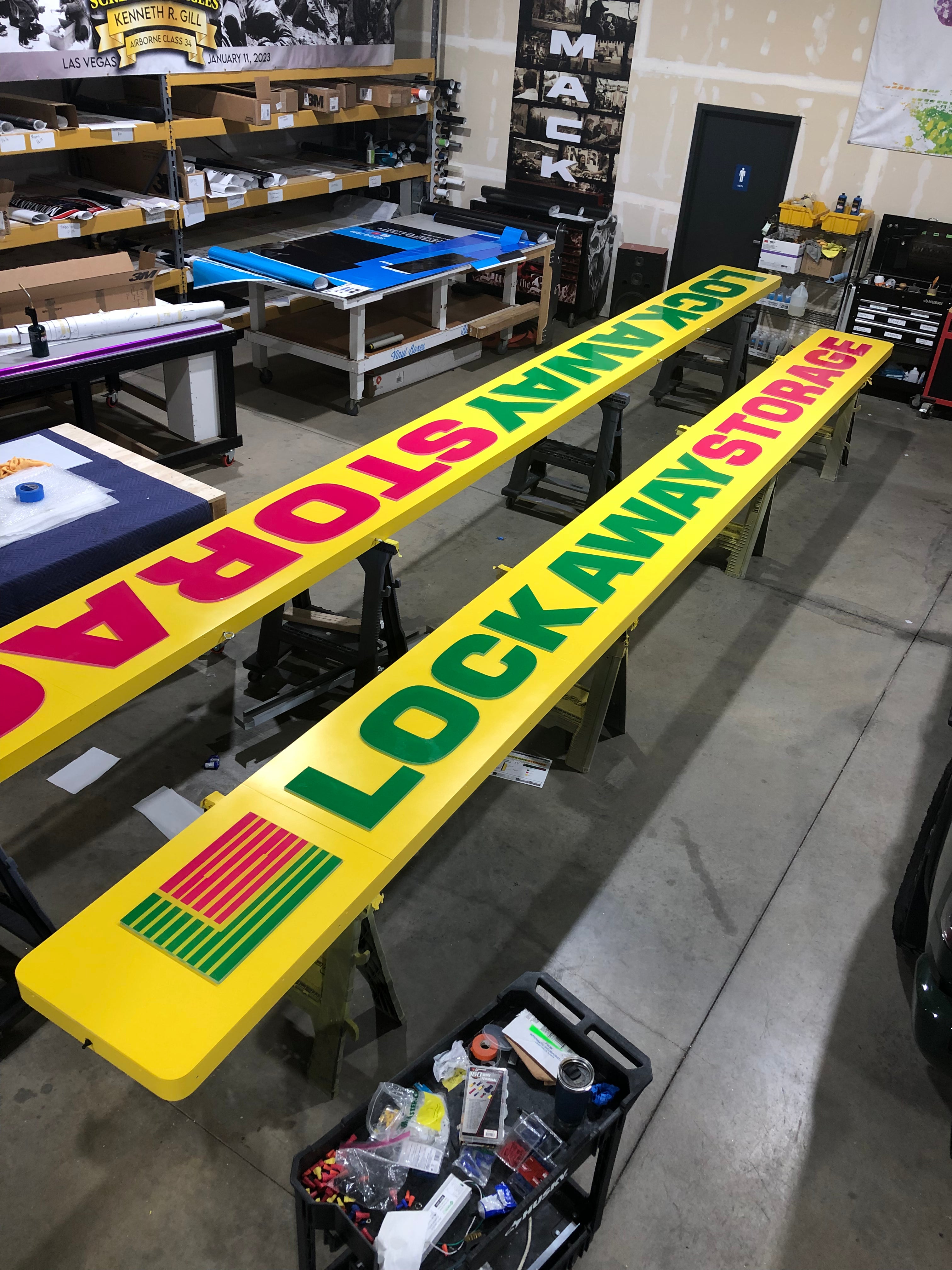 Custom made exterior storefront signage for Lock Away Storage, a chain storage across Colorado.