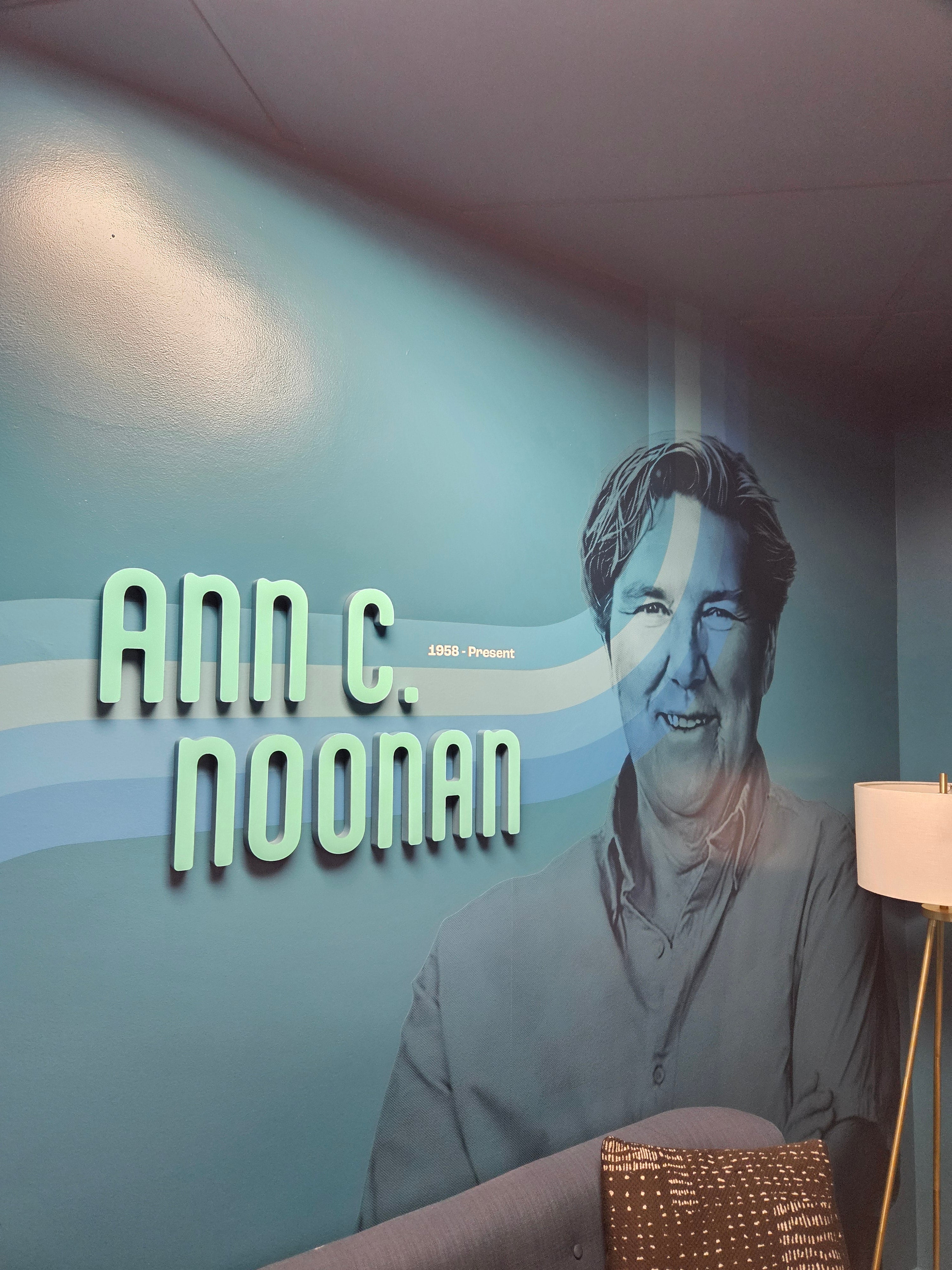 Rocky Mountain Equality Ann C. Noonan room in Boulder, Colorado, paired with wall vinyl and acrylic lettering.