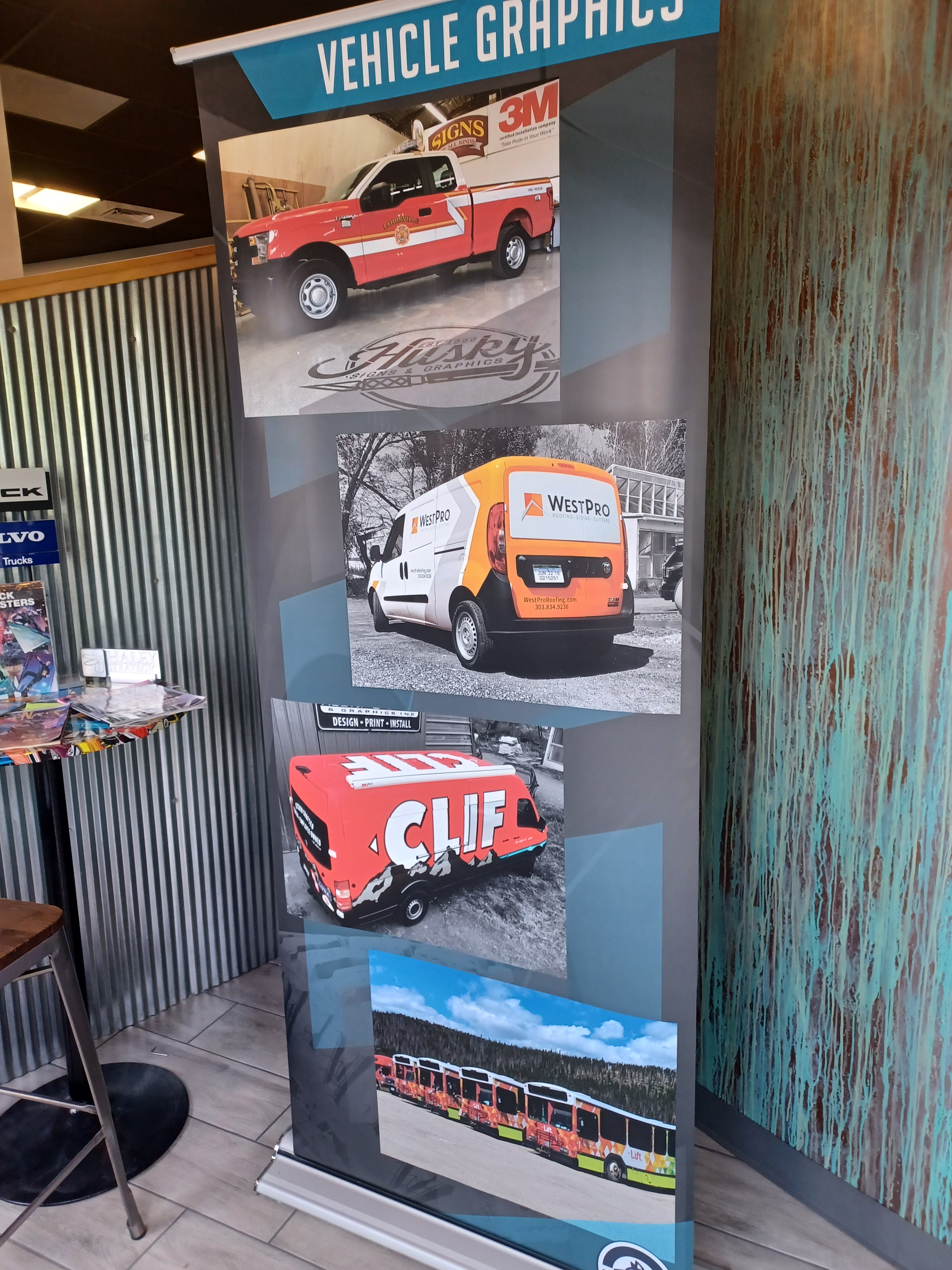 Husky Signs & Graphic's example of a retractable banner, showcasing what a Vehicle Graphic is and the difference they make.
