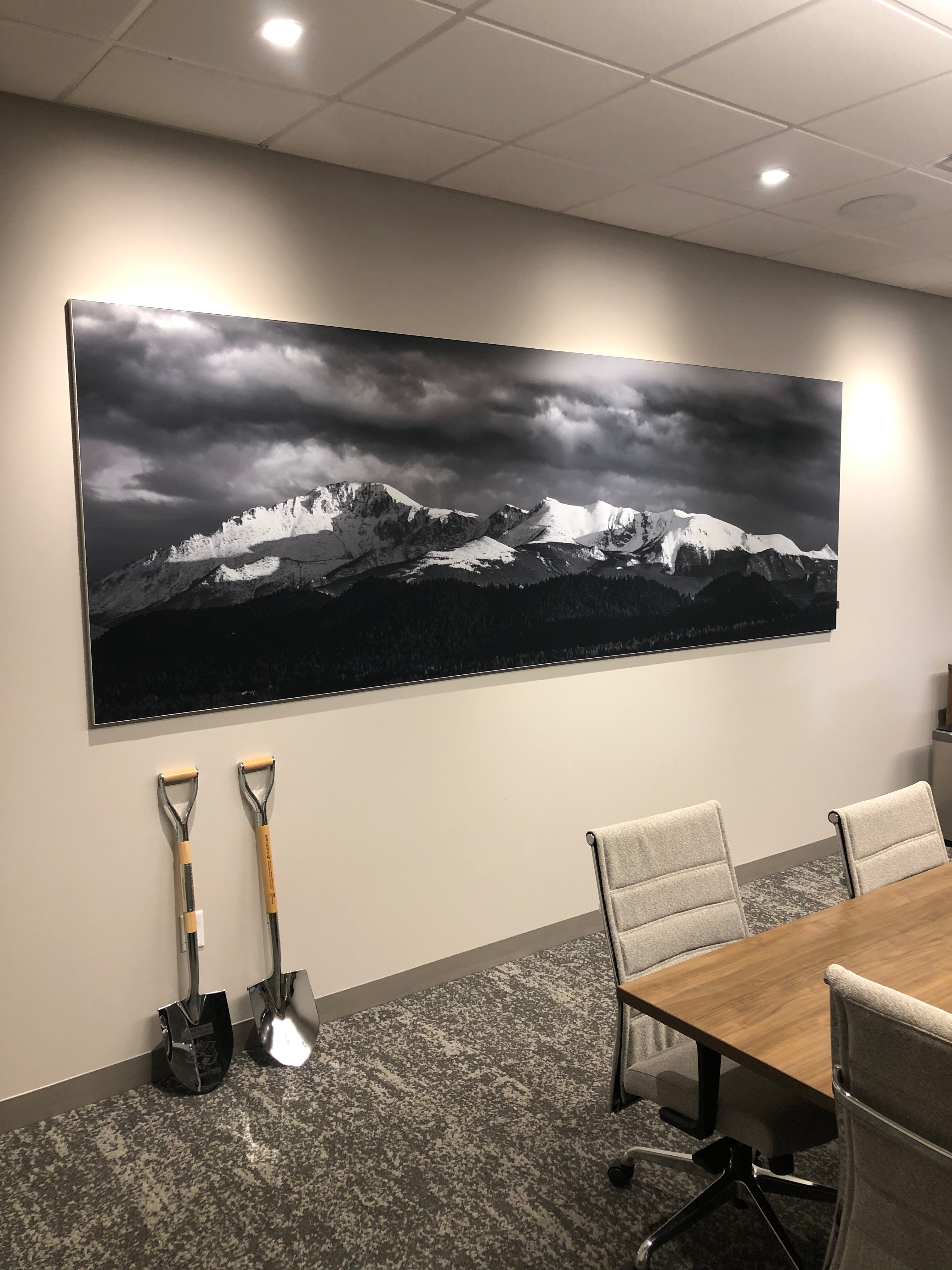 A wall-mounted fabric frame for Volvo's Atlanta, Georgia location, featuring a black and white photo of the Appalachian Mountains.