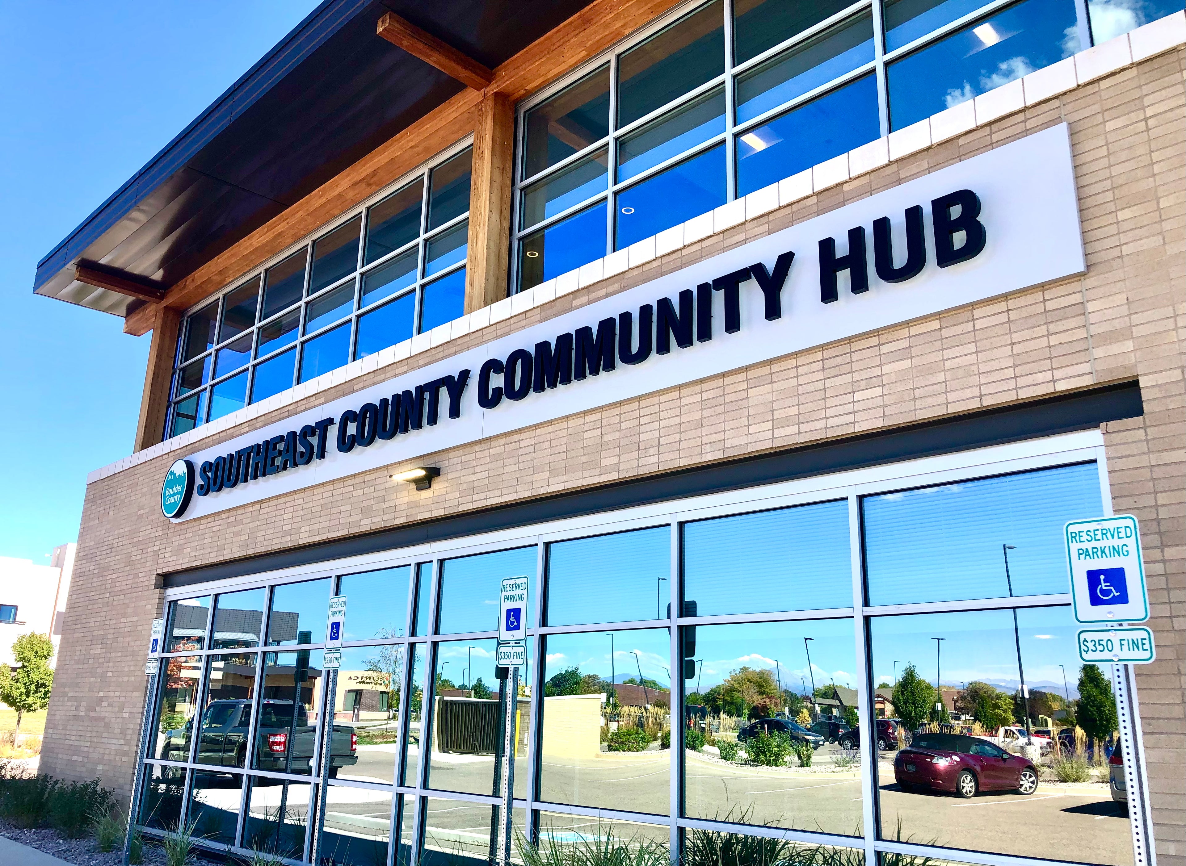 Picture of Southeast County Community Hub exterior custom fabricated signage for Boulder County.