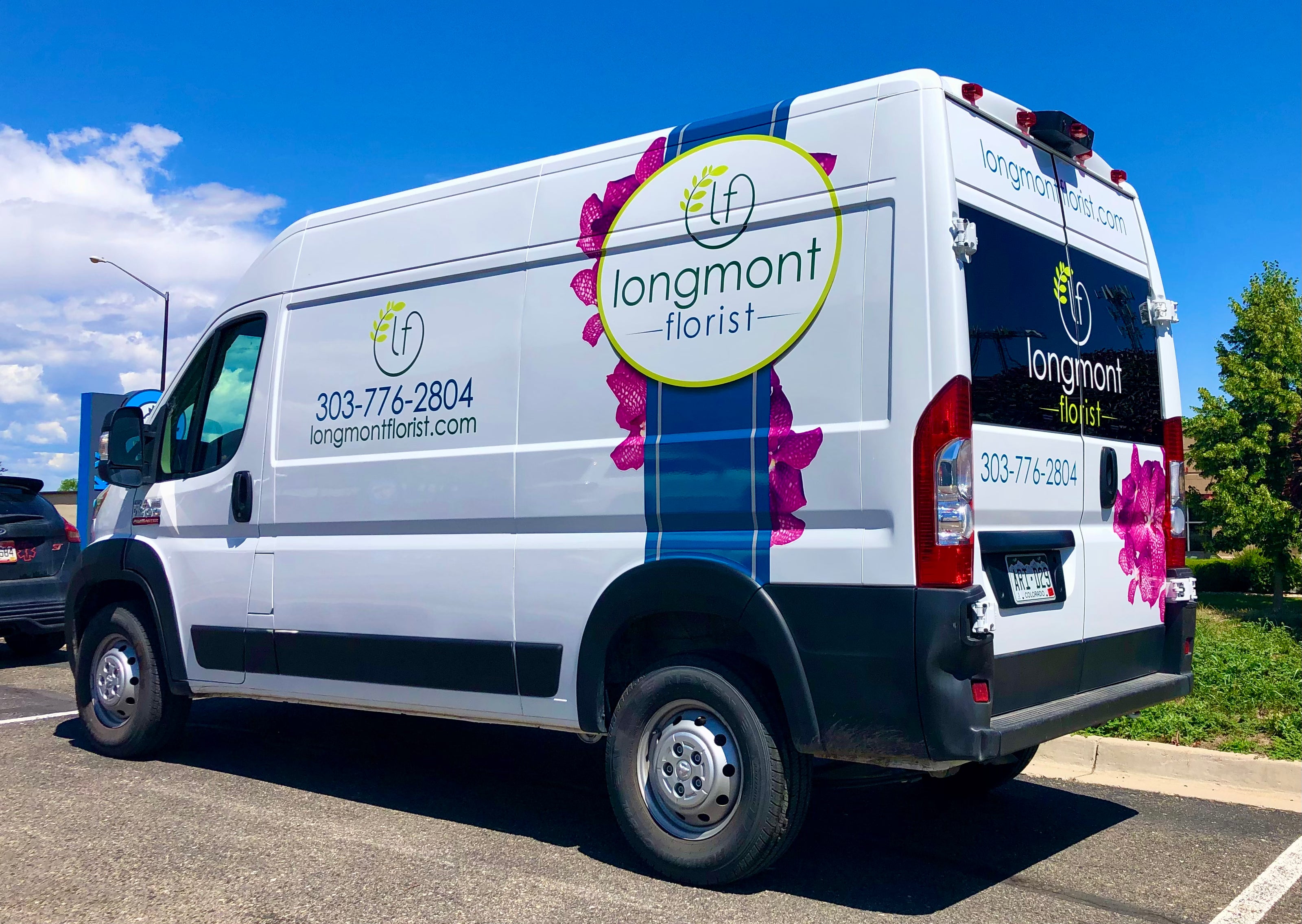 Partial and spot van vinyl wrap for Longmont Florist.