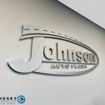 johnson auto plaza logo dimensional brushed alum 150x150 - Weather the Storm, Wow the Crowd: Durable Full Vehicle Wraps